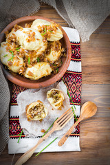 Ukrainian dumplings with cabbage, cheese and cherries