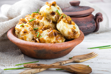 Ukrainian dumplings with cabbage, cheese and cherries