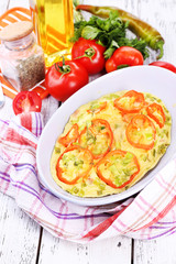 Casserole with vegetables in bowl  on table close-up