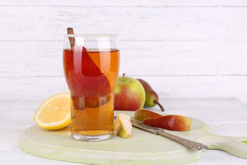 tasty summer drink with fresh fruits, on wooden table