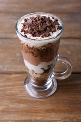 Yogurt, with chocolate cream, chopped chocolate and muesli