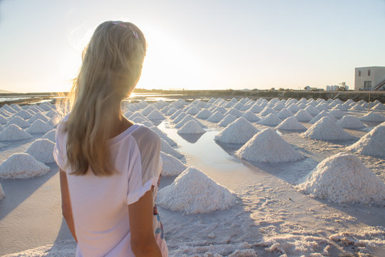 Woman At Salt Marsh On Sunset