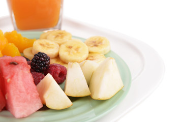 Slices of fruits with berries