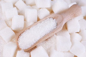 Fototapeta na wymiar White sugar in light background background