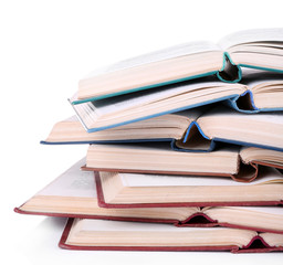 Books in a mess isolated on white