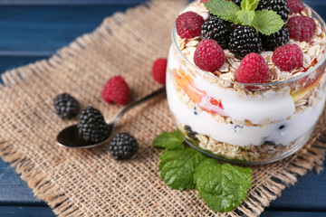 Healthy breakfast - yogurt with  fresh fruit, berries and