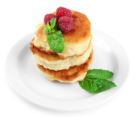 Tasty pancakes with fresh berries and mint leaf, isolated