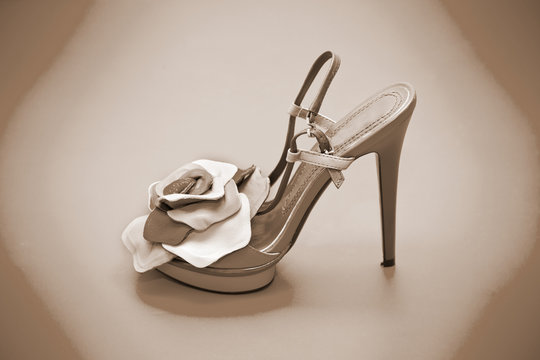 Women shoes with high heels, photo toning in sepia