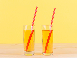 Apple juice on wood table.