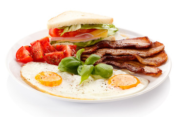 Breakfast - toast, egg, bacon and vegetables