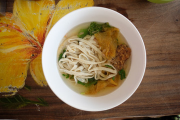 Thai fish noodle with clear soup.