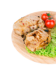 Grilled pork with vegetables.