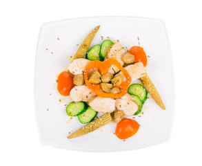 Warm meat salad with vegetables.