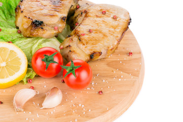 Grilled pork with vegetables.