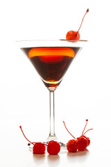 Manhattan cocktail garnished with a cherry