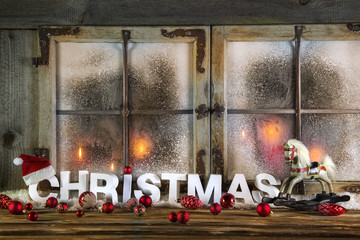 Weihnachtskarte mit Text Christmas oder Hintergrund mit Kerzen