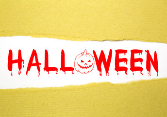 Halloween text on brown paper with white background