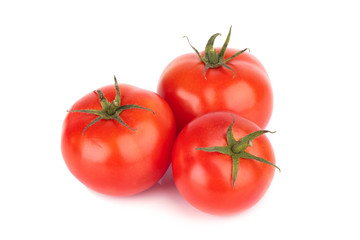 Tomato with drops isolated on white background