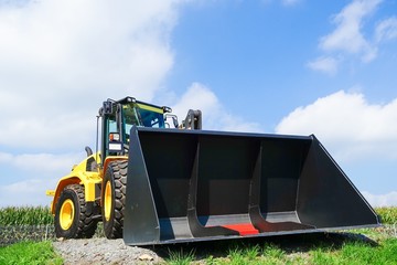 Obraz premium Neuer Radlader , Radladerschaufel