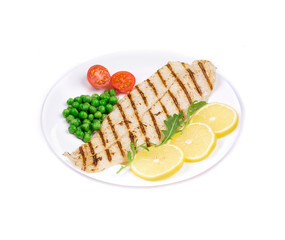 Grilled fish fillet with vegetables.