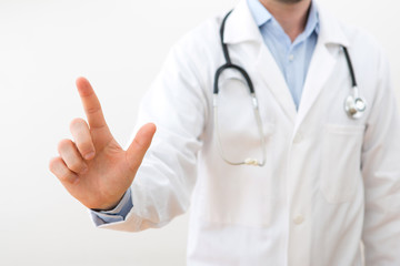 Professional doctor touching a touchscreen interface