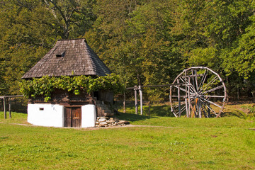 Fototapeta na wymiar Old house and watermill