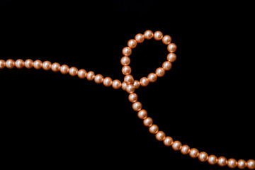 Decoration thread of orange pearls