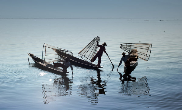 Traveling to Myanmar, outdoor photography of fishermen on boats