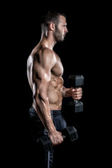 Man doing biceps curls in gym.