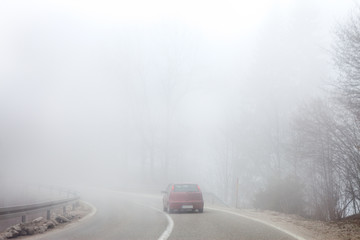 Road in thick fog