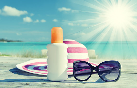 Hat, sunglasses and sun lotion. Exuma, Bahamas