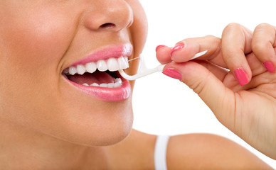 woman cleaning flossing