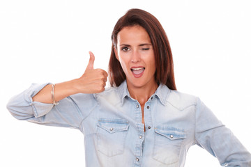 Satisfied young woman with good job gesture