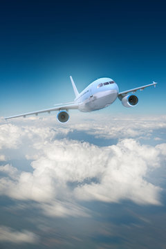 Fototapeta Airplane and clouds