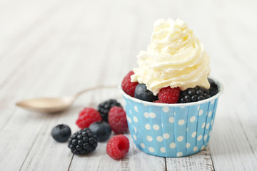 Fresh berries with whipped cream