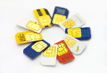Set of color SIM cards isolated on white background
