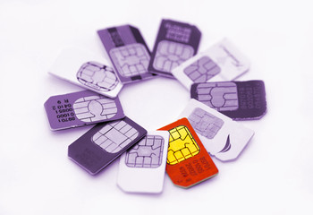 Set of color SIM cards isolated on white background