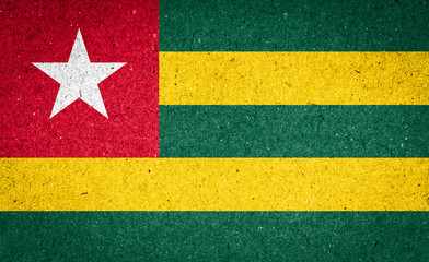 Togo flag on paper background