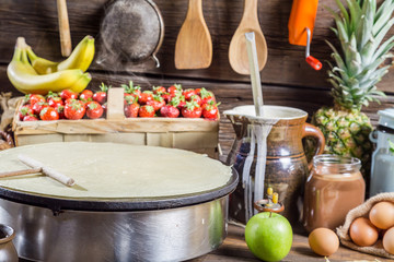 Preparing for pancakes with fruit