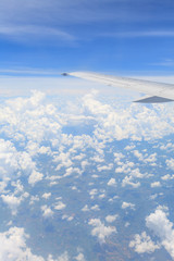 view from the airplane window, ocean blue