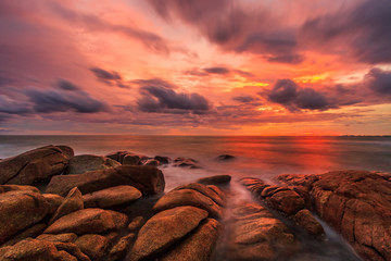 Fototapeta na wymiar Rock at the sea in the sunset