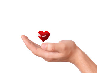 Obraz premium red heart in hand. love concept