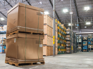 cardboard boxes in a store warehouse of automotive parts.
