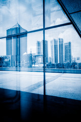 Fototapeta na wymiar Reflection of modern office building