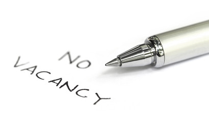 No vacancy written on a white paper
