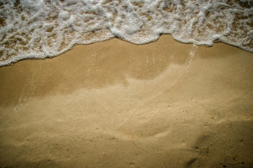Sand beach and wave