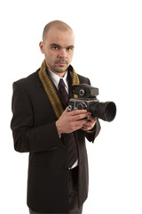 Fototapeta premium Man holding slr camera