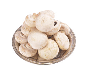 mushrooms  in a metal container isolated on a white background