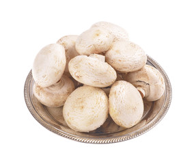 mushrooms  in a metal container isolated on a white background
