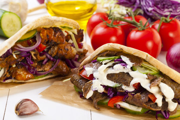 Kebab in a bun with garlic sauce